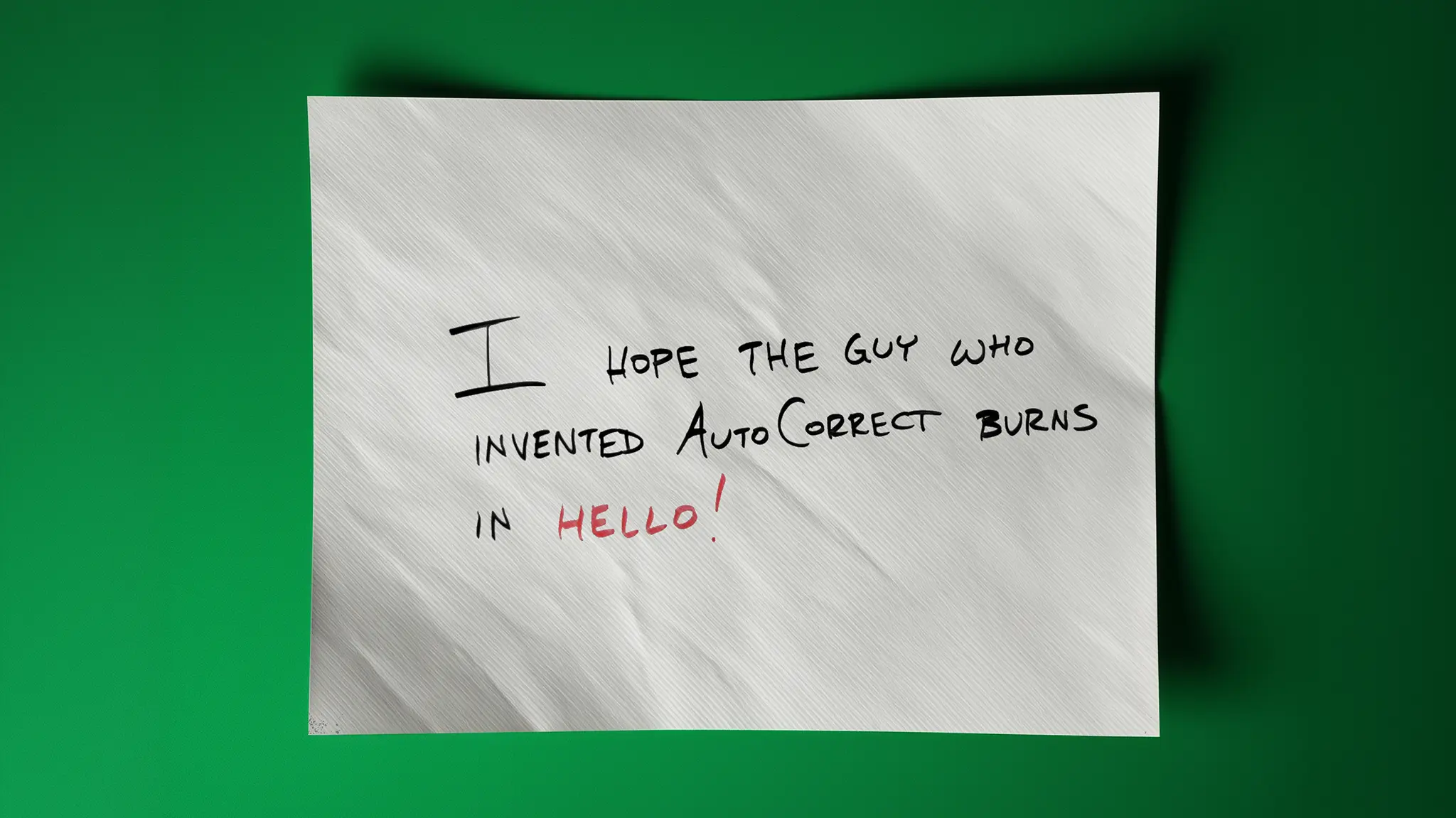 Textkorrektur mit Humor – Autokorrektur trifft ins Schwarze Whiteboard mit Aufschrift: I hope the guy who invented autocorrect burns in hello – humorvolle Anspielung auf Textkorrektur